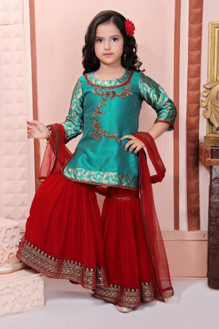 Nikhaar Creations Green Embroidered Silk Top with Hand Embroidery and Maroon Georgette Sharara with Embroidery Detailing on Hemline. Paired with Maroon Net Dupatta with borders on all sides.