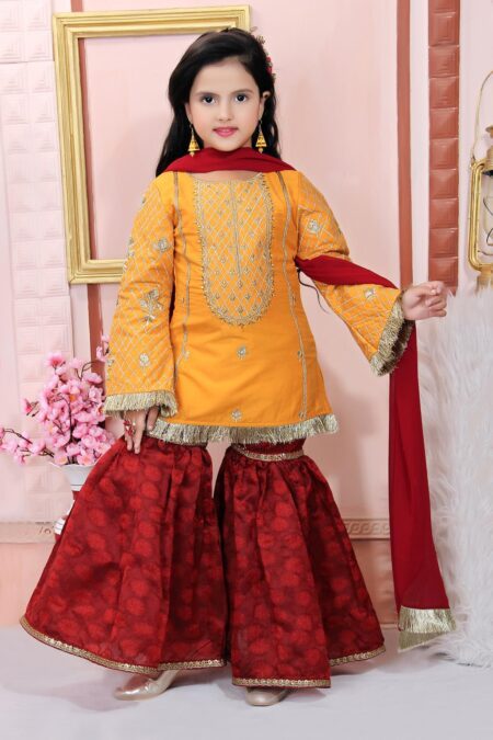 Kids Yellow Cotton Silk Top with Machine Embroidery on front yoke and embroidered sleeves