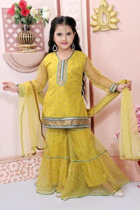 Kids Lime Gold Sequin Embroidered Net Short Kurti With Gold Embroidered Net Sharara. Embroidered Placket Below Neck Line And Gold Borders With Brocade On Neck Hemline Of Kurta And Hemline Of Sharara.